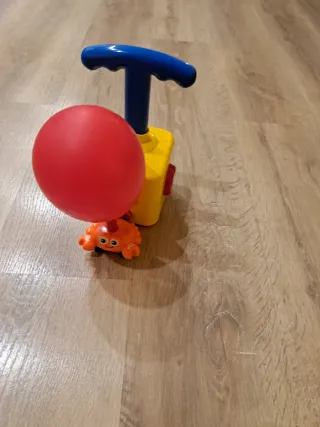 Juego coche infla globos