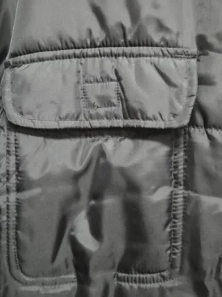 Abrigo negro acolchado