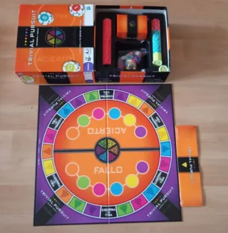 2 Juegos de mesa: ATRAPA UN MILLON TRIVIAL PURSUIT
