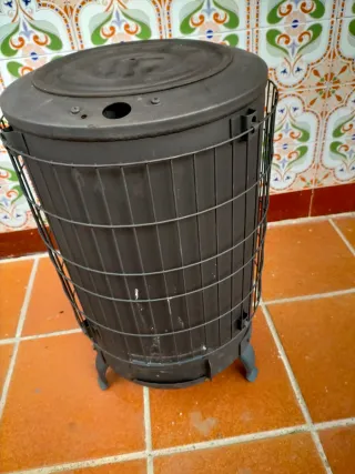 Chimenea de leña redonda