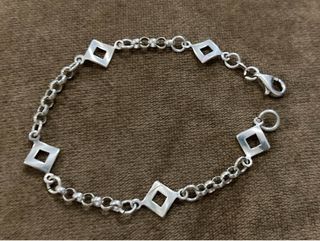 Pulsera de plata con eslabones y rombos