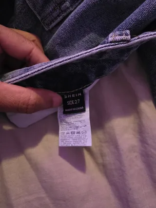 Jeans de pierna acampanada con rayas