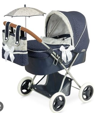 Cochecito de muñecas azul con bolso y sombrilla