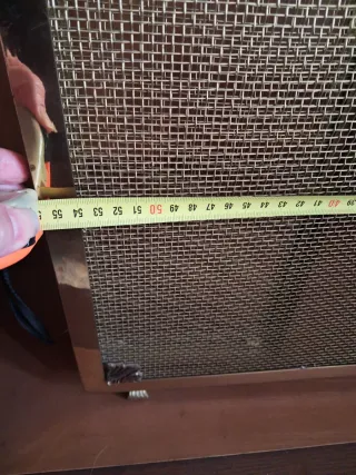 Protector de chimenea metálico dorado