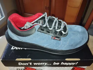 Zapatos de seguridad U-Power azules y rojos