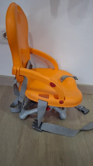 Trona portátil naranja