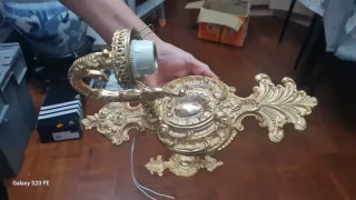 Lámparas de pared doradas antiguas