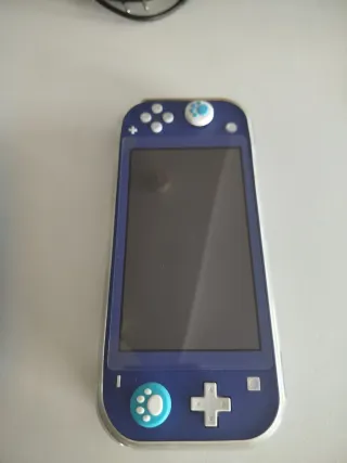 Nintendo Switch Lite Blu + custodia + gioco 30 in 1