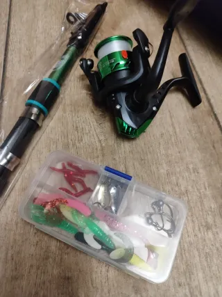 Caña de pescar y carrete nuevo a estrenar
