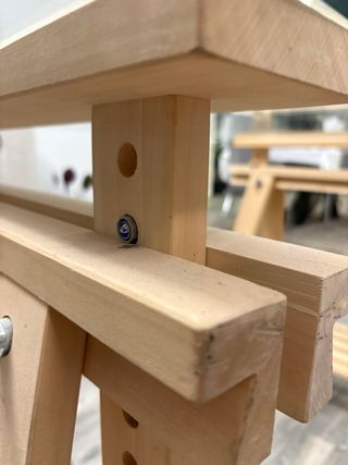 Mesa cristal 140x70 con caballetes madera