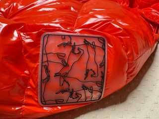 Plumas Parfois naranja brillante