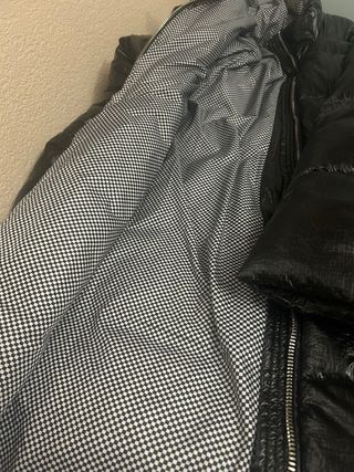 Plumífero largo negro