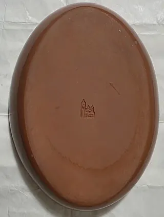 Casseruola in terracotta con cestino