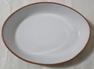 Casseruola in terracotta con cestino