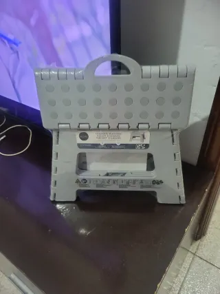 Taburete plegable gris