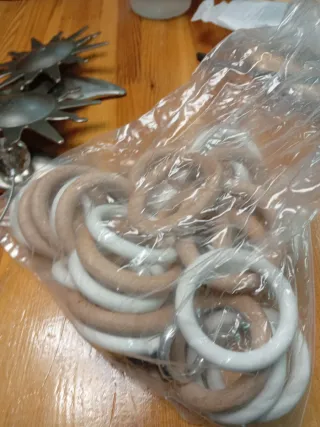 Adornos cortina sol, anillas y soportes