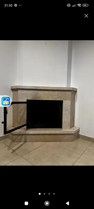 Chimenea de mármol y piedra color beige