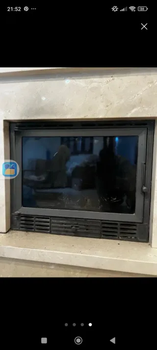 Chimenea de mármol y piedra color beige