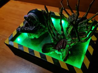 alien booknook with remote control to change color