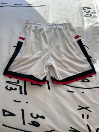 Pantalón corto baloncesto New Balance FEIA