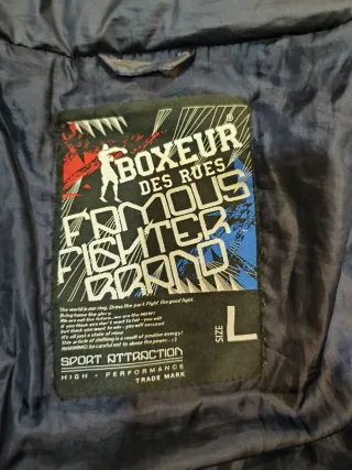 Plumas azul Boxeur des Rues