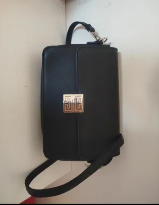 Borsa donna nera con chiusura metallica