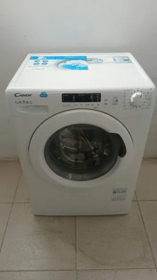 Lavadora Candy con garantía
