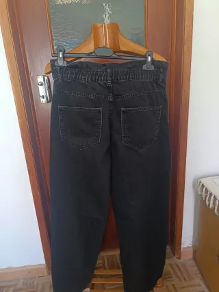 Calças pretas de ganga