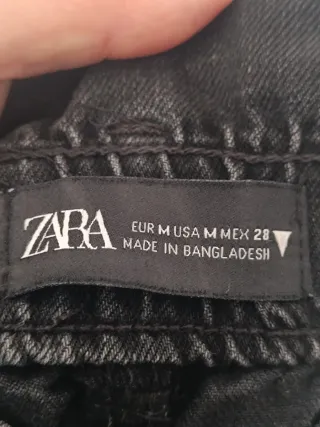 Calças pretas de ganga