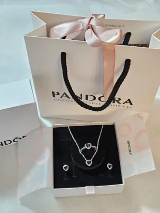 Conjunto.  Con su caja y bolsa