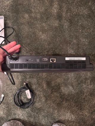 Playstation 3 Negra con Mandos y Juegos