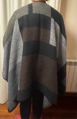 Capa de punto con cierre de botón