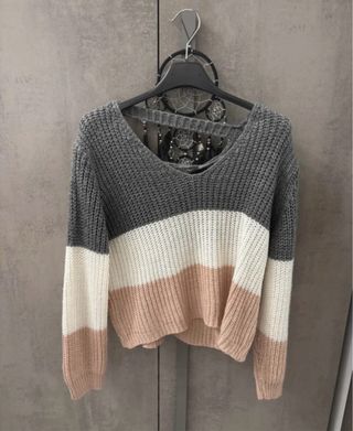 Maglione con schiena scoperta