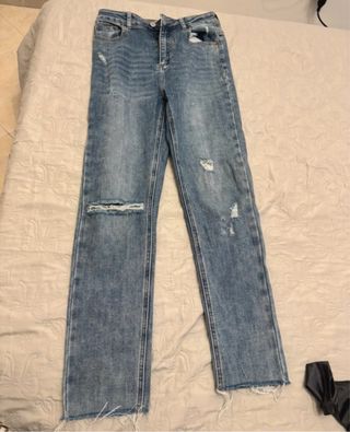 Jeans strappi blu