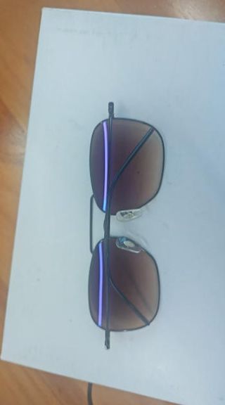 Gafas de sol Ray-Ban negras y marrones