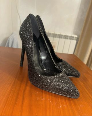 Tacchi eleganti neri glitter