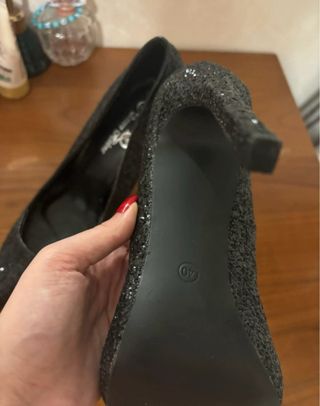 Tacchi eleganti neri glitter