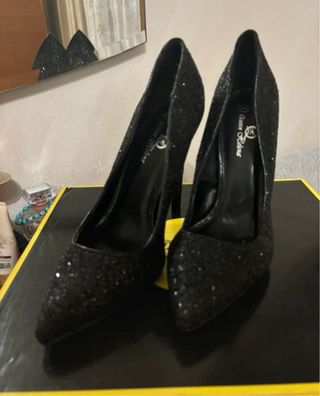 Tacchi eleganti neri glitter
