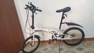 Bici pieghevole bianca da 20" e nera da 24".....