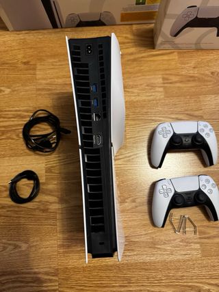 PlayStation 5 con 2 mandos y garantía