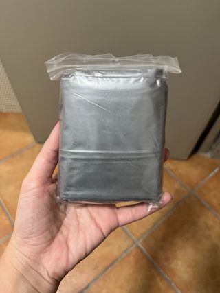 Kit auto: impermeabile, torcia, guanti