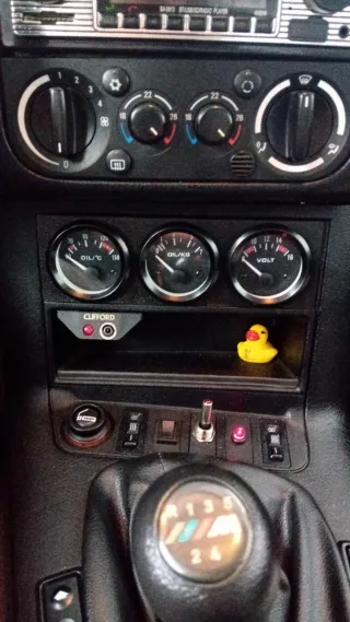 Soporte 3 relojes de 52mm en BMW E36