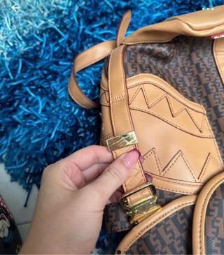 Zaino Sprayground marrone e rosso