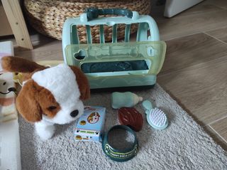 Perro de juguete con transportín y accesorios