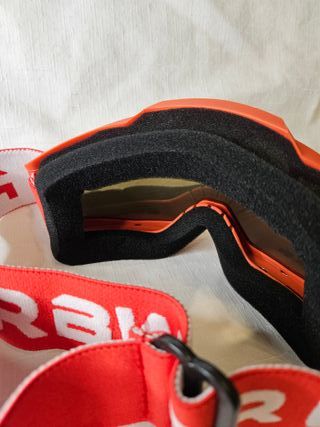 Gafas de esquí naranjas con lente espejo