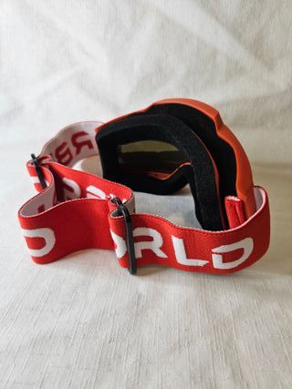 Gafas de esquí naranjas con lente espejo