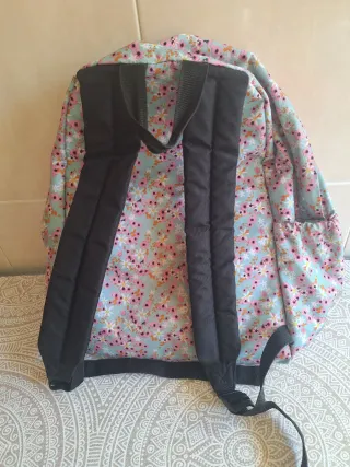 Mochila Eastpak floral azul y rosa