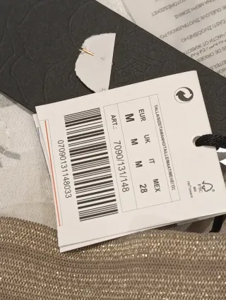 Falda Stradivarius plumas rosa XS