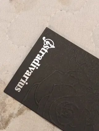 Falda Stradivarius plumas rosa XS