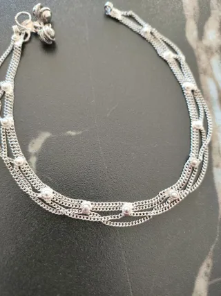 Tobillera plateada con cascabeles